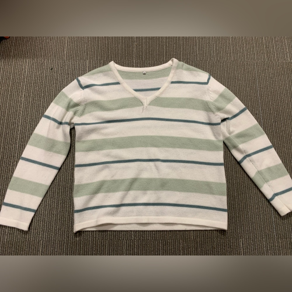 Green and white sweater